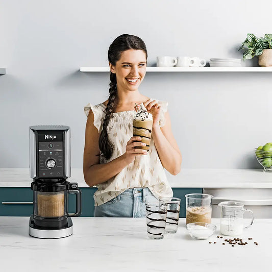 Ninja CREAMi Deluxe NC501 making frozen drinks and slushies