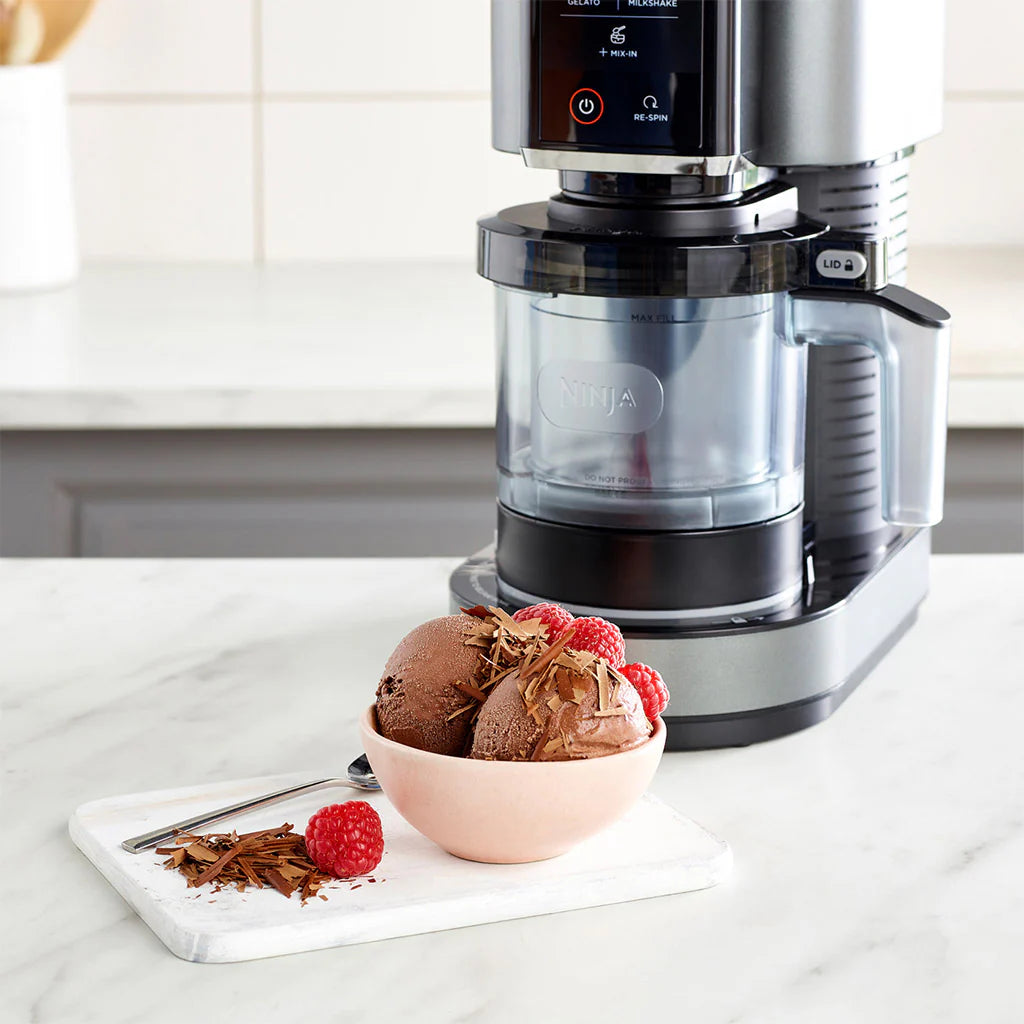 Ninja CREAMi NC300UK with pint tub making homemade ice cream