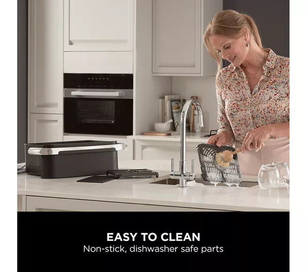 Ninja AF500UK dual zone cooking — air frying in one zone while roasting in the other at different temperatures